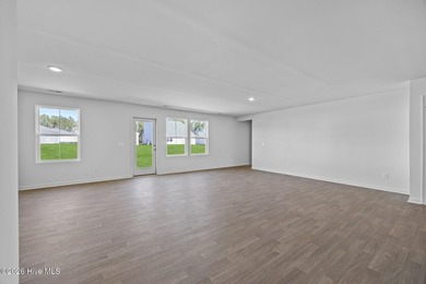 Single-story new construction home situated on Lot #5 on The Lakes Country Club in North Carolina - for sale on GolfHomes.com, golf home, golf lot