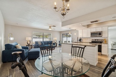 Welcome to this beautifully maintained 3-bedroom, 2-bath pool on Oak Hills Country Club in Florida - for sale on GolfHomes.com, golf home, golf lot