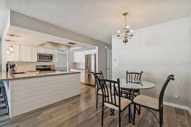 Welcome to this beautifully maintained 3-bedroom, 2-bath pool on Oak Hills Country Club in Florida - for sale on GolfHomes.com, golf home, golf lot