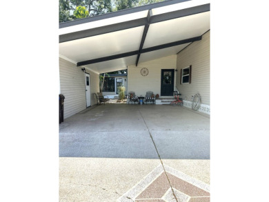 This spacious residence of 2 bedroom features oasis landscaping on Schalamar Creek Golf and Country Club in Florida - for sale on GolfHomes.com, golf home, golf lot