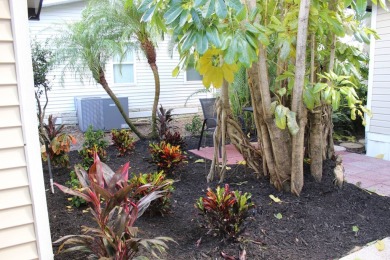 This spacious residence of 2 bedroom features oasis landscaping on Schalamar Creek Golf and Country Club in Florida - for sale on GolfHomes.com, golf home, golf lot