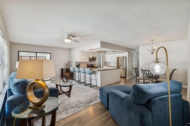 Welcome to this beautifully maintained 3-bedroom, 2-bath pool on Oak Hills Country Club in Florida - for sale on GolfHomes.com, golf home, golf lot