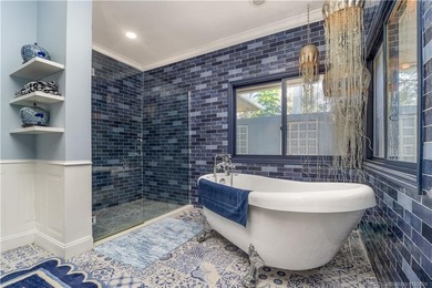 Truly remarkable home designed by Gary Kelly sits on almost 1/2 on Heritage Ridge Golf Club in Florida - for sale on GolfHomes.com, golf home, golf lot