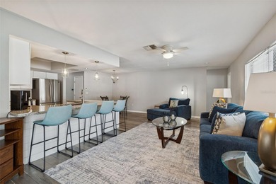 Welcome to this beautifully maintained 3-bedroom, 2-bath pool on Oak Hills Country Club in Florida - for sale on GolfHomes.com, golf home, golf lot