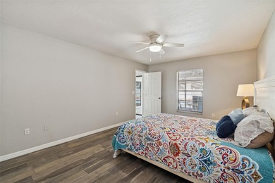 Welcome to this beautifully maintained 3-bedroom, 2-bath pool on Oak Hills Country Club in Florida - for sale on GolfHomes.com, golf home, golf lot