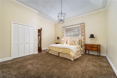 Truly remarkable home designed by Gary Kelly sits on almost 1/2 on Heritage Ridge Golf Club in Florida - for sale on GolfHomes.com, golf home, golf lot