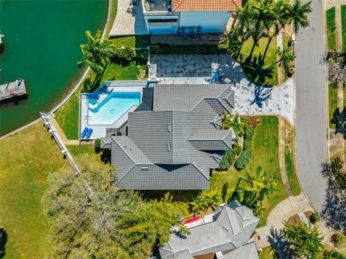 Welcome to this beautiful waterfront residence that perfectly on Pasadena Yacht and Country Club in Florida - for sale on GolfHomes.com, golf home, golf lot
