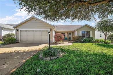 BOND PAID! This beautifully 3/2 - all furniture and some on The Links of Spruce Creek in Florida - for sale on GolfHomes.com, golf home, golf lot