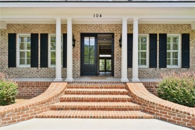 Step into timeless elegance in this beautifully crafted brick on Savannah Quarters Country Club in Georgia - for sale on GolfHomes.com, golf home, golf lot