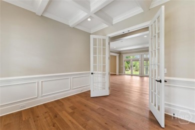 Step into timeless elegance in this beautifully crafted brick on Savannah Quarters Country Club in Georgia - for sale on GolfHomes.com, golf home, golf lot