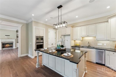 Step into timeless elegance in this beautifully crafted brick on Savannah Quarters Country Club in Georgia - for sale on GolfHomes.com, golf home, golf lot