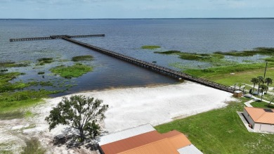 Come check out this rare opportunity to purchase a half-acre lot on Indian Lake Estates Golf and Country Club in Florida - for sale on GolfHomes.com, golf home, golf lot