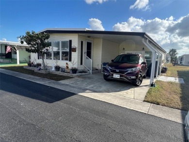 This charming 1,284-square-foot home, located in the flourishing on Palm Hill Golf Club in Florida - for sale on GolfHomes.com, golf home, golf lot