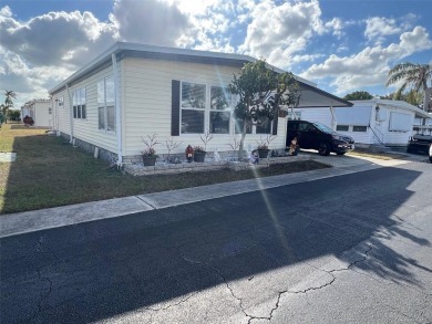 This charming 1,284-square-foot home, located in the flourishing on Palm Hill Golf Club in Florida - for sale on GolfHomes.com, golf home, golf lot