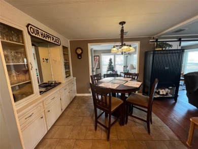 This charming 1,284-square-foot home, located in the flourishing on Palm Hill Golf Club in Florida - for sale on GolfHomes.com, golf home, golf lot