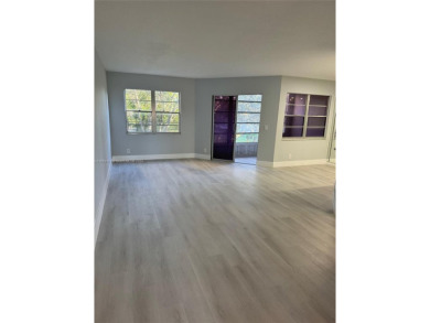 WELCOME TO THIS SPACIOUS, SPOTLESS AND BRIGHT APARTMENT. FRESHLY on Flamingo Lakes Country Club in Florida - for sale on GolfHomes.com, golf home, golf lot