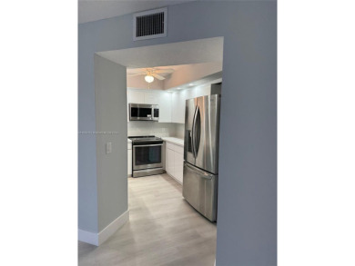 WELCOME TO THIS SPACIOUS, SPOTLESS AND BRIGHT APARTMENT. FRESHLY on Flamingo Lakes Country Club in Florida - for sale on GolfHomes.com, golf home, golf lot