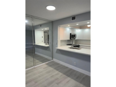 WELCOME TO THIS SPACIOUS, SPOTLESS AND BRIGHT APARTMENT. FRESHLY on Flamingo Lakes Country Club in Florida - for sale on GolfHomes.com, golf home, golf lot