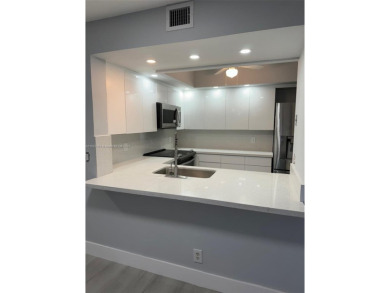 WELCOME TO THIS SPACIOUS, SPOTLESS AND BRIGHT APARTMENT. FRESHLY on Flamingo Lakes Country Club in Florida - for sale on GolfHomes.com, golf home, golf lot