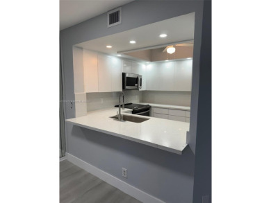 WELCOME TO THIS SPACIOUS, SPOTLESS AND BRIGHT APARTMENT. FRESHLY on Flamingo Lakes Country Club in Florida - for sale on GolfHomes.com, golf home, golf lot