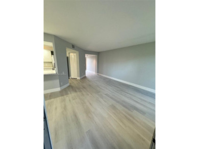 WELCOME TO THIS SPACIOUS, SPOTLESS AND BRIGHT APARTMENT. FRESHLY on Flamingo Lakes Country Club in Florida - for sale on GolfHomes.com, golf home, golf lot
