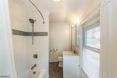 Step into timeless elegance with this stunning Victorian charmer on Mt Tabor Country Club in New Jersey - for sale on GolfHomes.com, golf home, golf lot