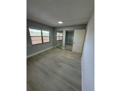 WELCOME TO THIS SPACIOUS, SPOTLESS AND BRIGHT APARTMENT. FRESHLY on Flamingo Lakes Country Club in Florida - for sale on GolfHomes.com, golf home, golf lot