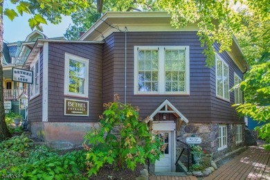Step into timeless elegance with this stunning Victorian charmer on Mt Tabor Country Club in New Jersey - for sale on GolfHomes.com, golf home, golf lot