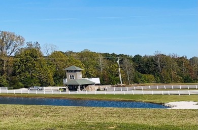 Nestled in the heart of prestigious Riverwatch Trace on Water on Riverwatch Golf Club in Tennessee - for sale on GolfHomes.com, golf home, golf lot