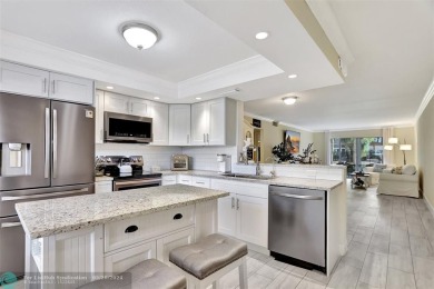 Wow! Newly Renovated Open Kitchen, island, soft close drawers on Wynmoor Golf Course in Florida - for sale on GolfHomes.com, golf home, golf lot