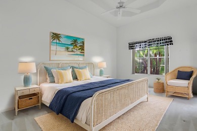 This single-story, three-bedroom / three-bathroom home offers a on PGA National Golf Club in Florida - for sale on GolfHomes.com, golf home, golf lot