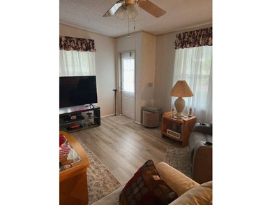 Spacious home in The Hamptons Golf & Country Club Resort on Hamptons Golf Club in Florida - for sale on GolfHomes.com, golf home, golf lot