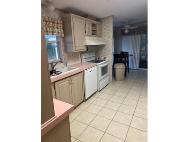 Spacious home in The Hamptons Golf & Country Club Resort on Hamptons Golf Club in Florida - for sale on GolfHomes.com, golf home, golf lot