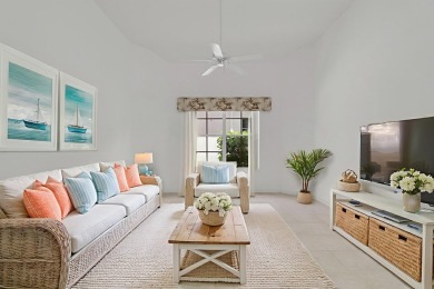 This single-story, three-bedroom / three-bathroom home offers a on PGA National Golf Club in Florida - for sale on GolfHomes.com, golf home, golf lot