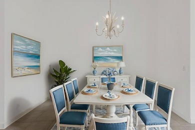 This single-story, three-bedroom / three-bathroom home offers a on PGA National Golf Club in Florida - for sale on GolfHomes.com, golf home, golf lot