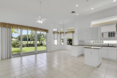 This single-story, three-bedroom / three-bathroom home offers a on PGA National Golf Club in Florida - for sale on GolfHomes.com, golf home, golf lot