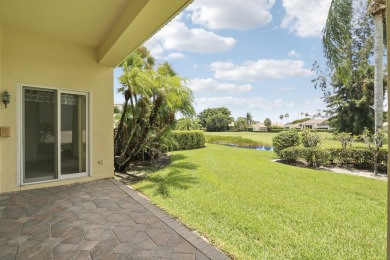 This single-story, three-bedroom / three-bathroom home offers a on PGA National Golf Club in Florida - for sale on GolfHomes.com, golf home, golf lot