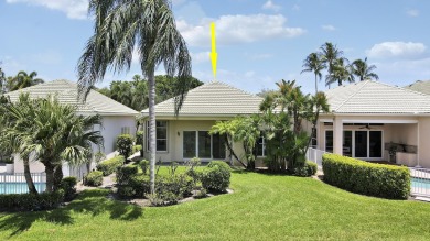 This single-story, three-bedroom / three-bathroom home offers a on PGA National Golf Club in Florida - for sale on GolfHomes.com, golf home, golf lot