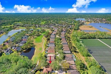 Discover your dream home in the prestigious, gated River Hills on River Hills Country Club in Florida - for sale on GolfHomes.com, golf home, golf lot