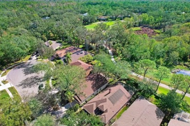 Discover your dream home in the prestigious, gated River Hills on River Hills Country Club in Florida - for sale on GolfHomes.com, golf home, golf lot