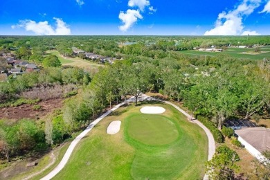 Discover your dream home in the prestigious, gated River Hills on River Hills Country Club in Florida - for sale on GolfHomes.com, golf home, golf lot