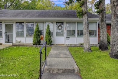 Updated & move-in ready, this 2 BR, 2 Bath home with a one car on Greenbriar Woodlands in New Jersey - for sale on GolfHomes.com, golf home, golf lot