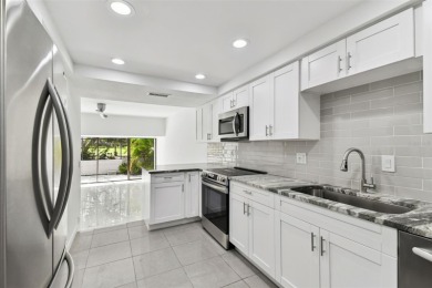 Welcome to this TURN KEY beautifully updated 4-bedroom on Emerald Greens Golf Resort and Country Club in Florida - for sale on GolfHomes.com, golf home, golf lot