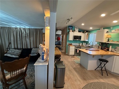 2 bedroom 1 bath with covered deck and parking. Newly remodeled on Riverview Golf Course in Arizona - for sale on GolfHomes.com, golf home, golf lot