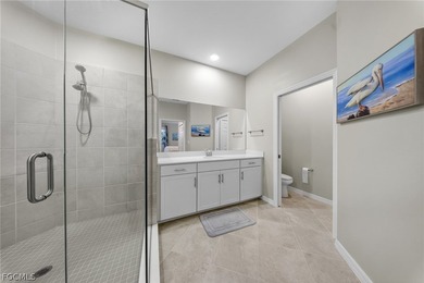 Beautiful Baycreek coach home in Babcock National with social on Babcock National Golf Course in Florida - for sale on GolfHomes.com, golf home, golf lot