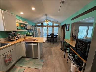 2 bedroom 1 bath with covered deck and parking. Newly remodeled on Riverview Golf Course in Arizona - for sale on GolfHomes.com, golf home, golf lot