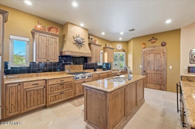 Quality & Luxury abound throughout this wonderful estate on Mirabel Golf Club in Arizona - for sale on GolfHomes.com, golf home, golf lot