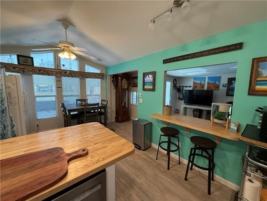 2 bedroom 1 bath with covered deck and parking. Newly remodeled on Riverview Golf Course in Arizona - for sale on GolfHomes.com, golf home, golf lot