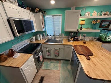 2 bedroom 1 bath with covered deck and parking. Newly remodeled on Riverview Golf Course in Arizona - for sale on GolfHomes.com, golf home, golf lot