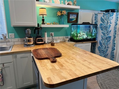 2 bedroom 1 bath with covered deck and parking. Newly remodeled on Riverview Golf Course in Arizona - for sale on GolfHomes.com, golf home, golf lot